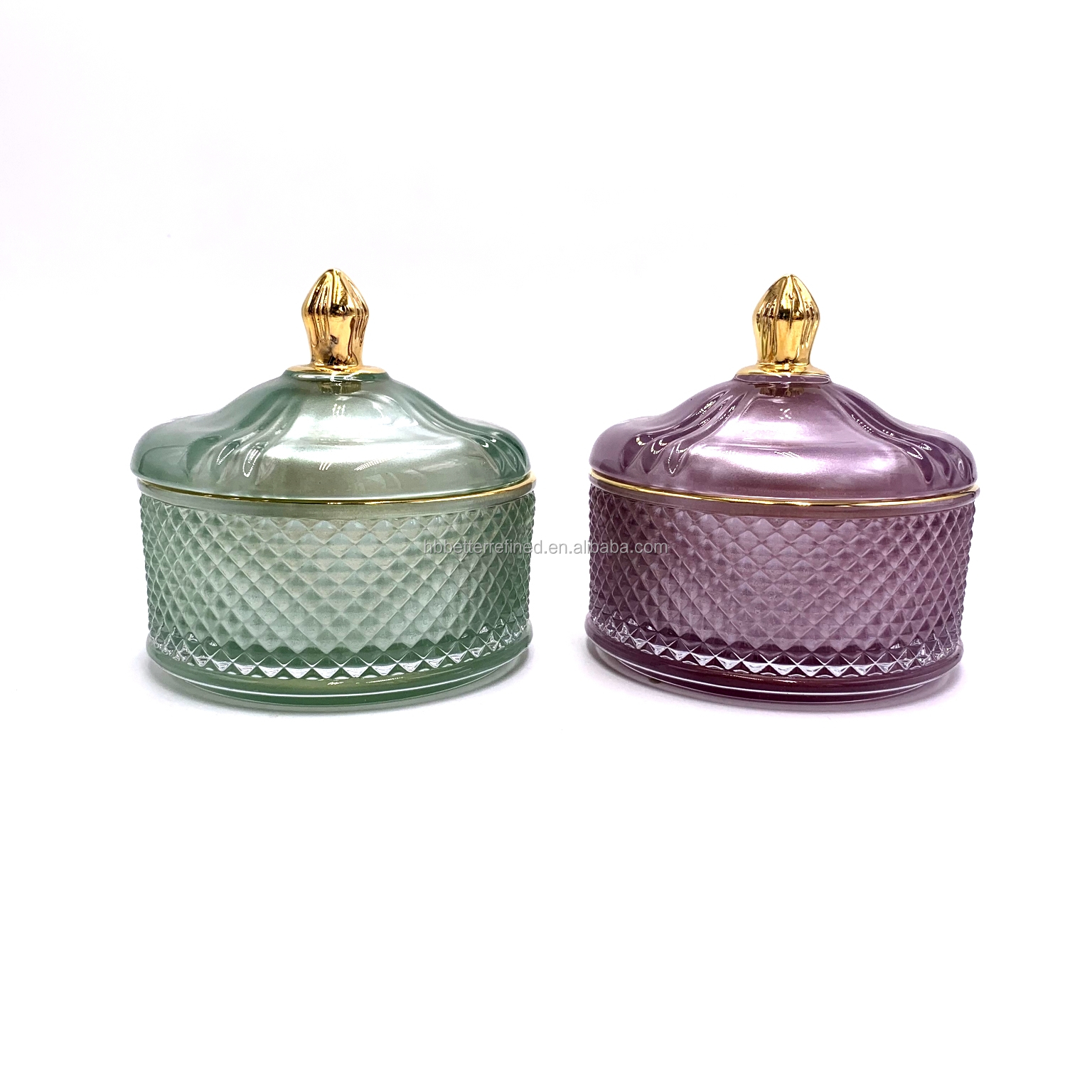 colored glass candle jar with gold rim and knob